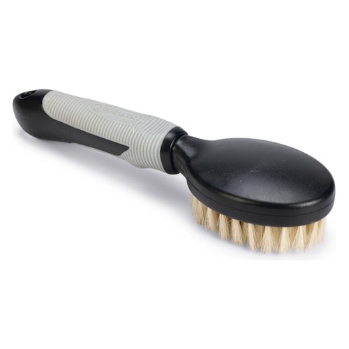 Achterkant van de zachte hondenborstel met antislip handvat