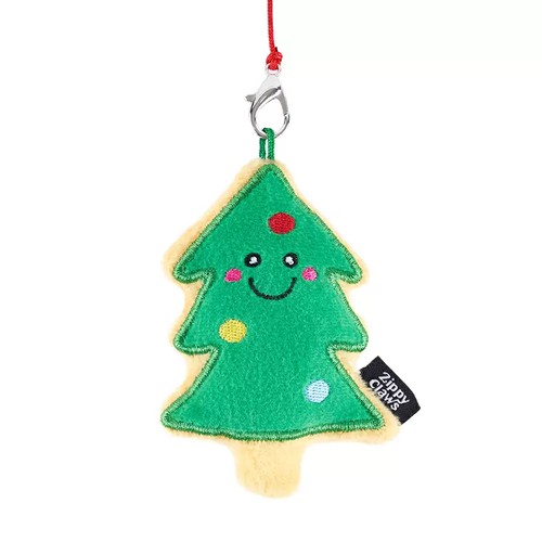 Groen kerstboomkoekje met lachend gezichtje aan karabijnhaakje