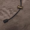 Detail van het verstelbare koord met metalen toggle