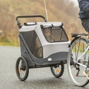 TRIXIE hondenfietskar met hond, tijdens het fietsen op de weg