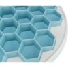 Detail van de zeshoekige vakjes en de rand van de voederplaat Hive